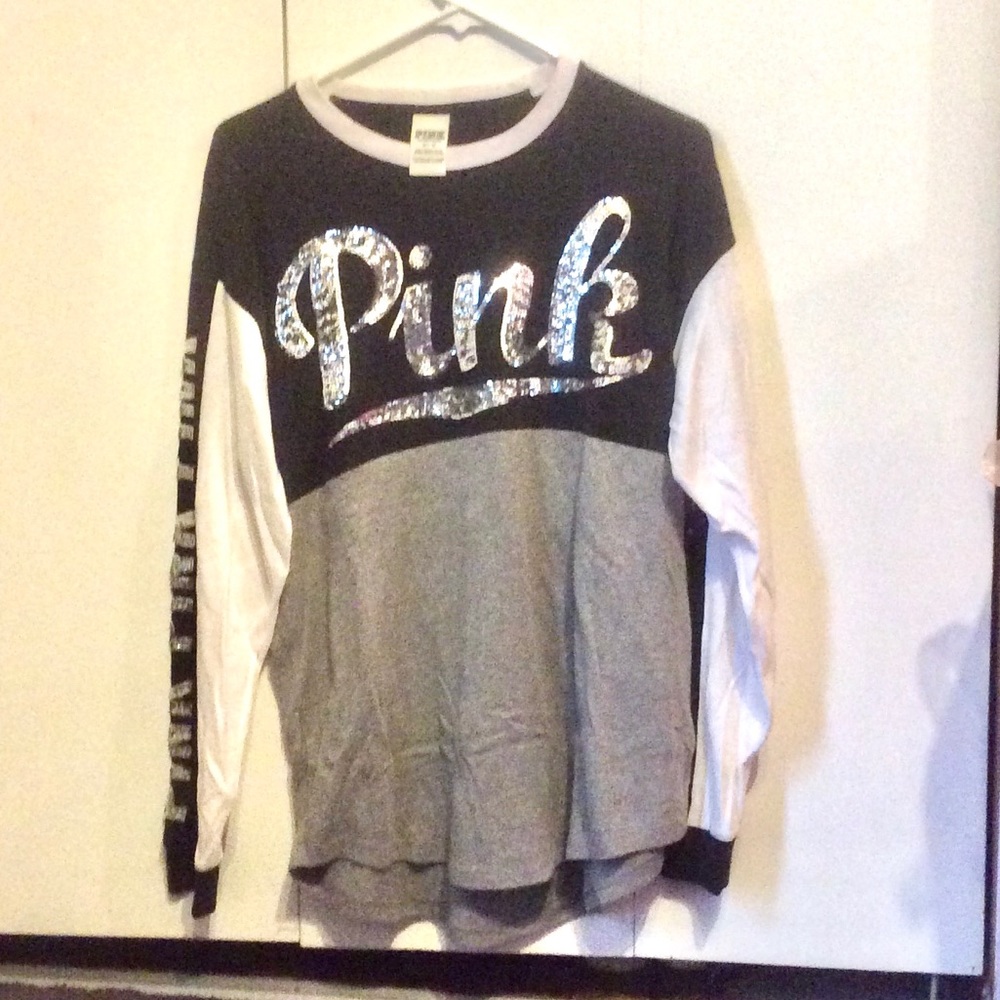 Long sleeved Pink shirt.